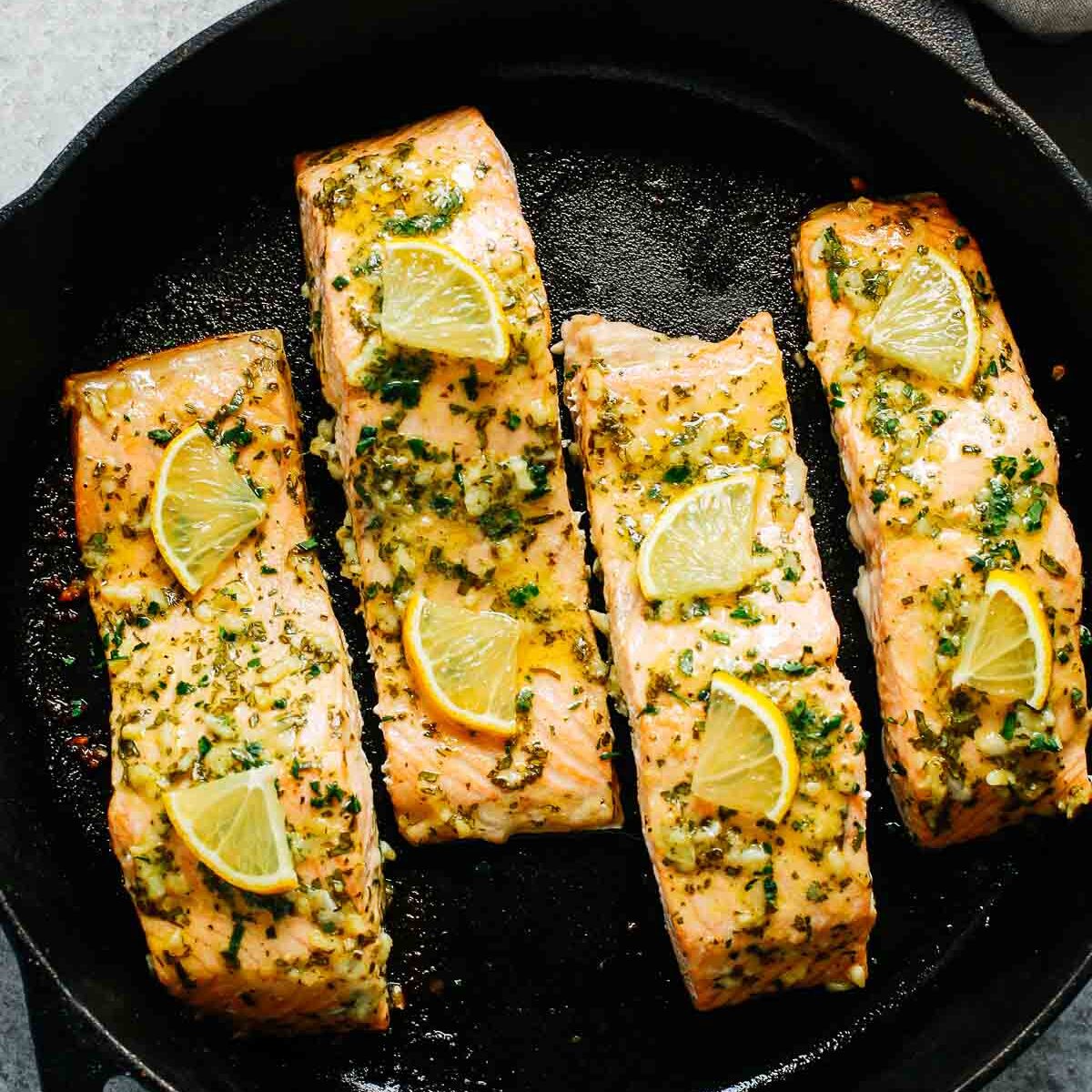 Dijon mustard salmon in a cast iron skillet. One of my favorite date night dinner ideas. 