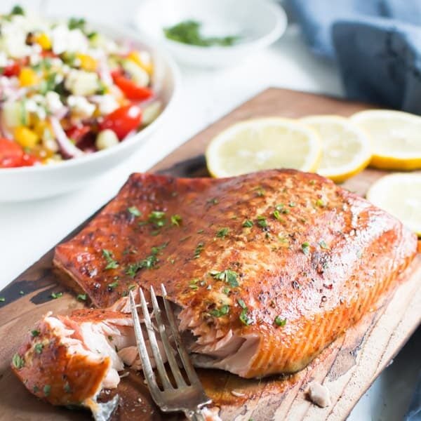 Salmon on a cedar plank with lemon. 