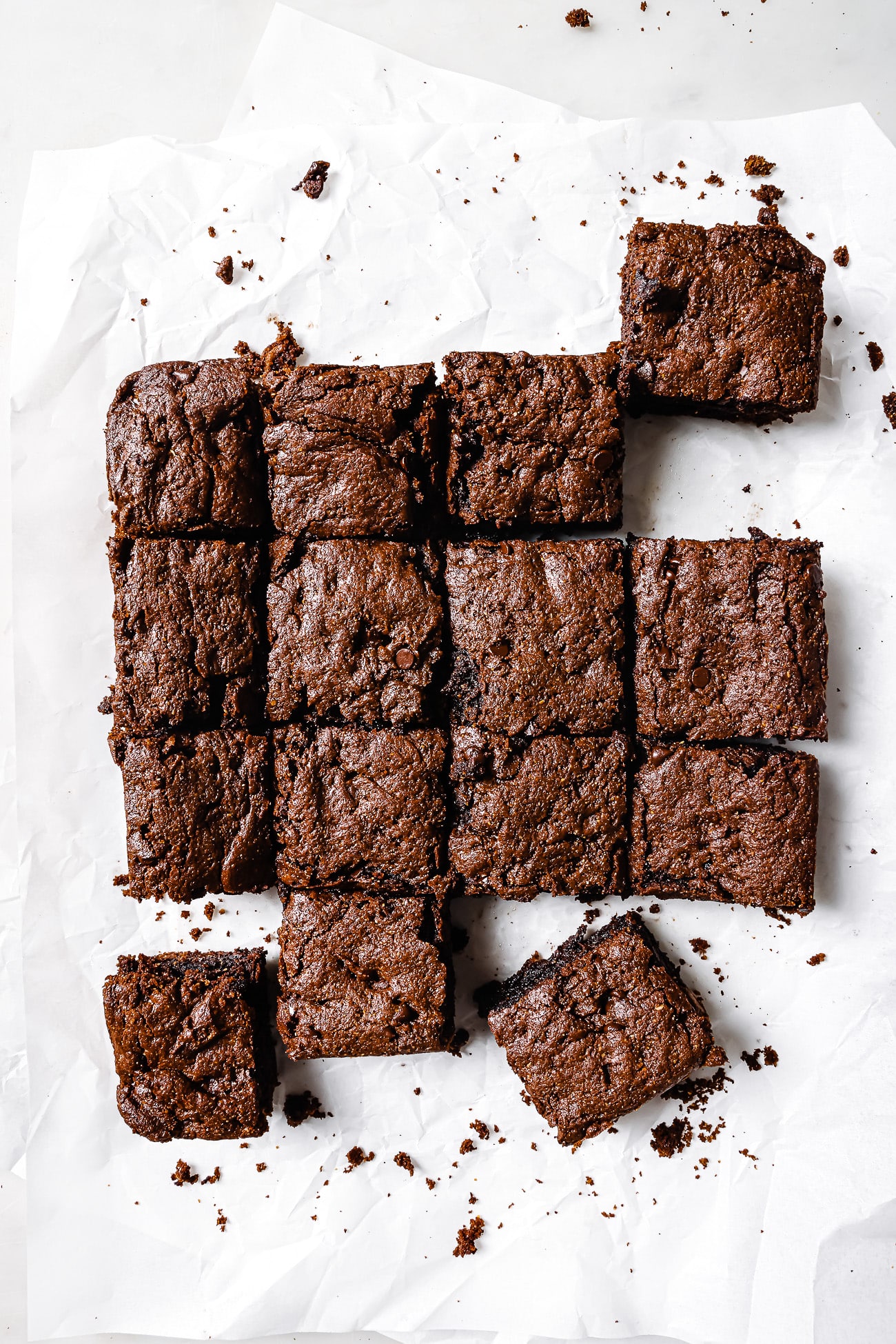 Close up of flourless brownies cut into servings. 