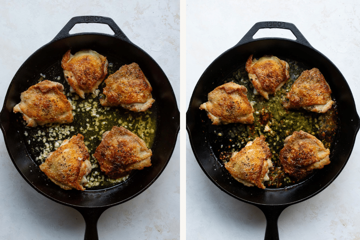 overhead view of Chicken Thighs with crispy skin in a cast iron skillet with butter and garlic