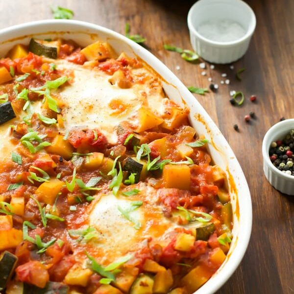 Baked Eggs with Veggies in a casserole dish. 