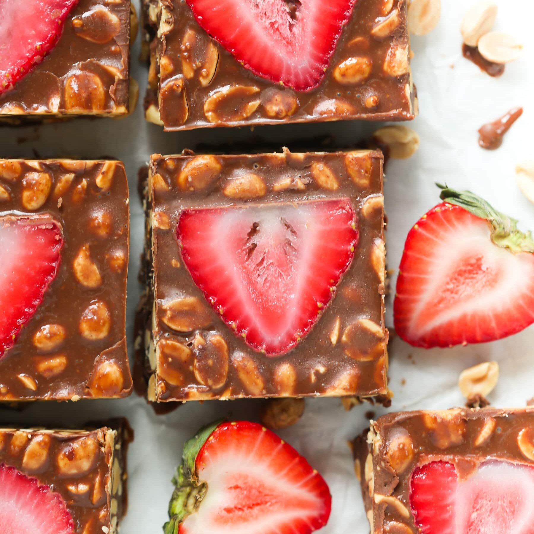 Squares of Low-Carb No Bake Chocolate Strawberry Bars.