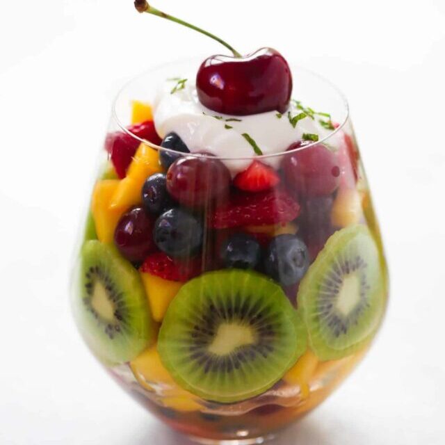 Fruit Salad in a glass cup.