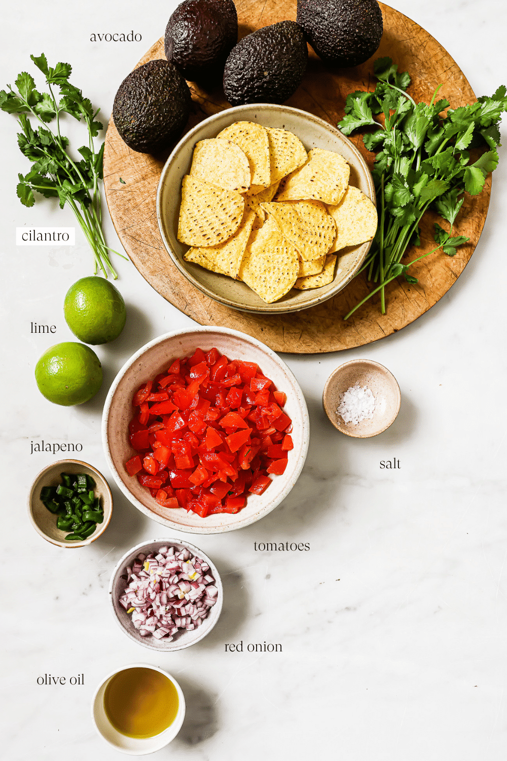Pre-measured ingredients for avocado salsa.
