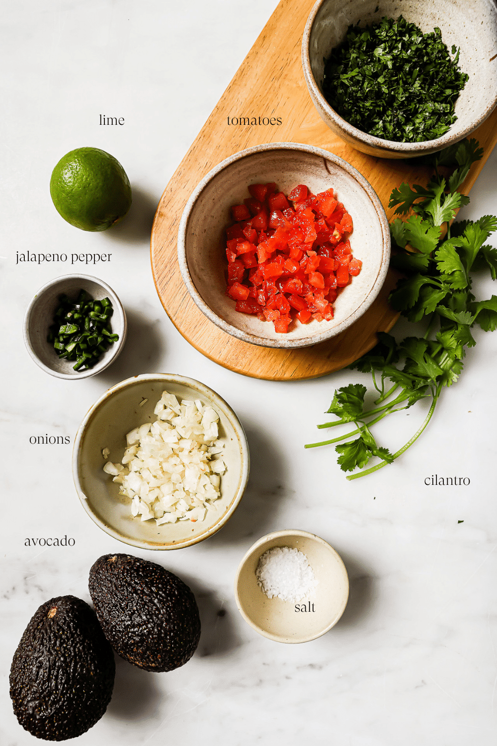 Small bowls of pre-measured ingredients. 