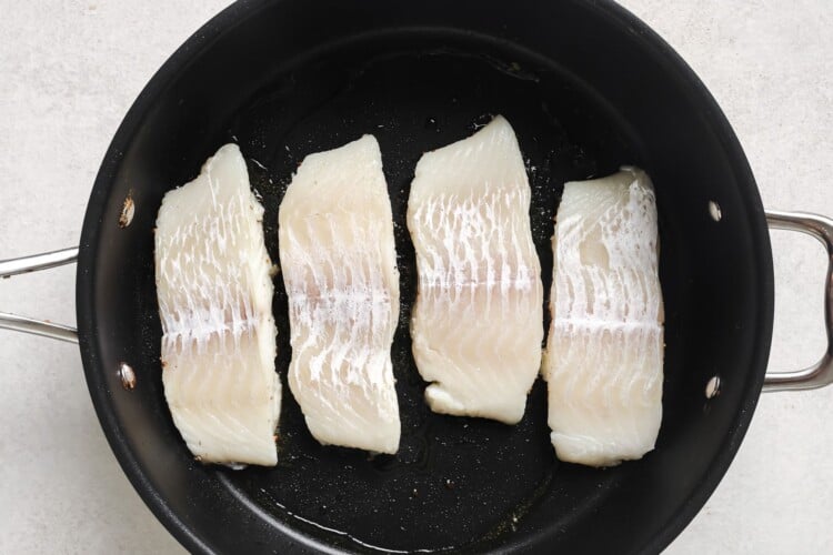 raw Haddock fillets in a skillet
