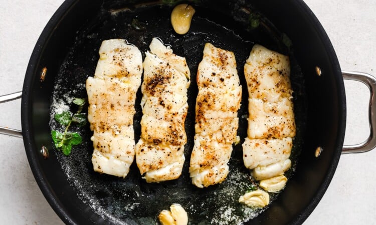 Garlic Butter Haddock in a skillet