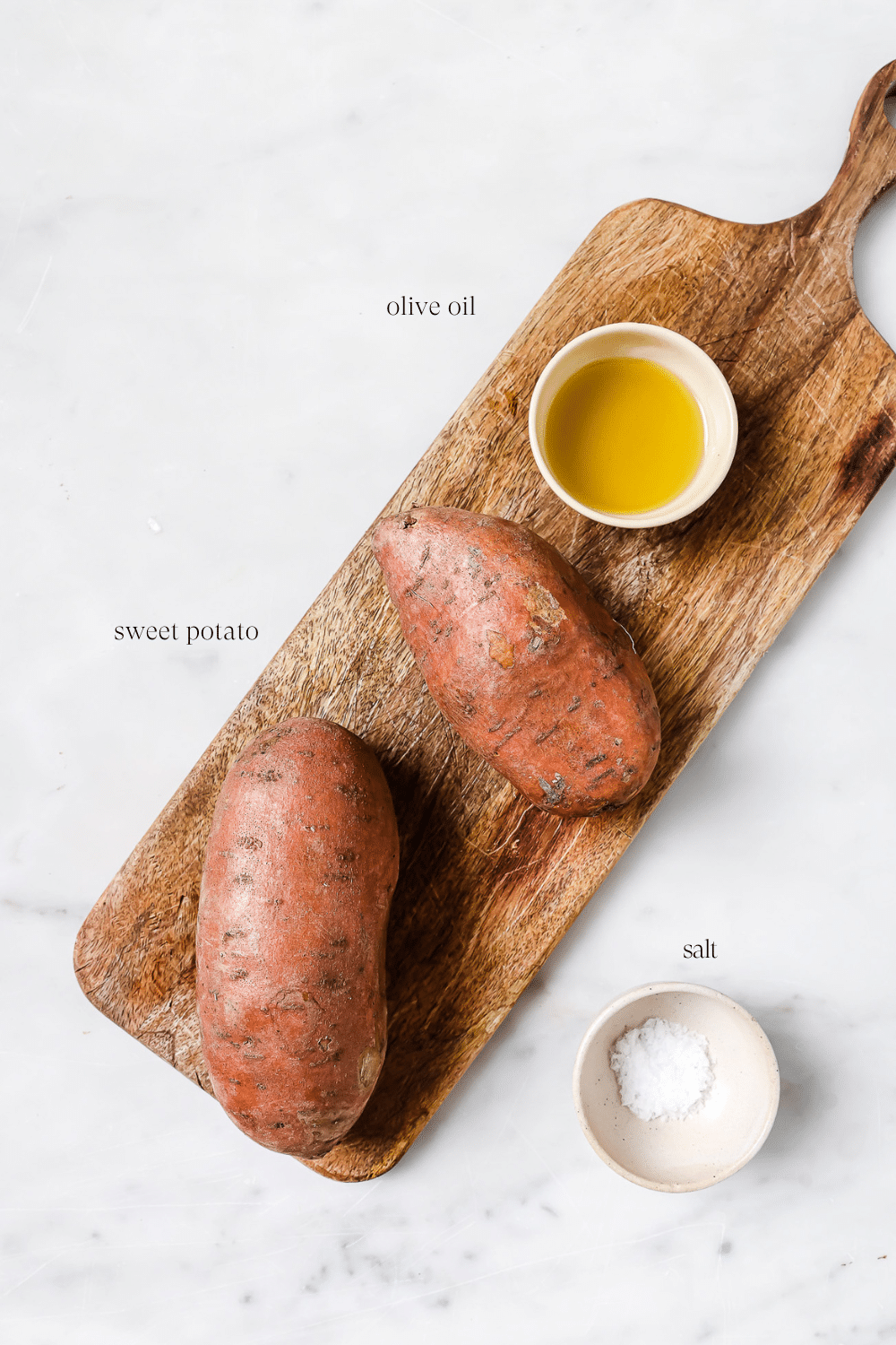 Ingredients prepped and set out on a wooden cutting board.