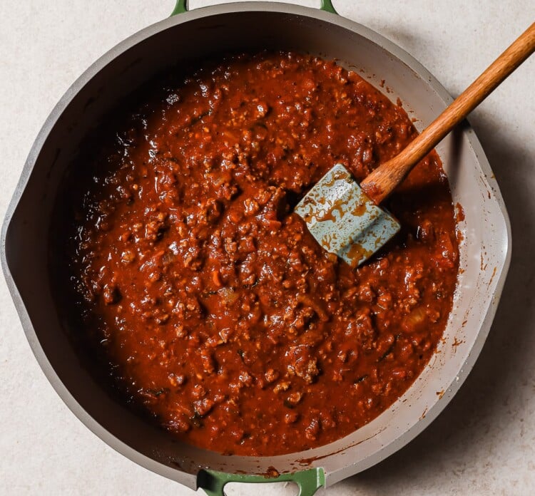 ground beef and tomato sauce in a skillet