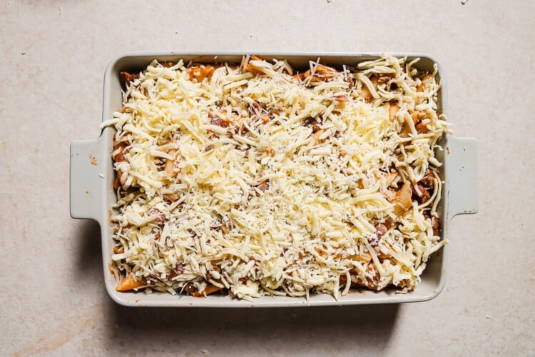 baked ziti in a white casserole