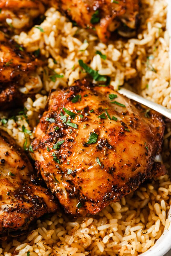 Baked Chicken Thighs and Rice – With Buttery Garlic Rice!