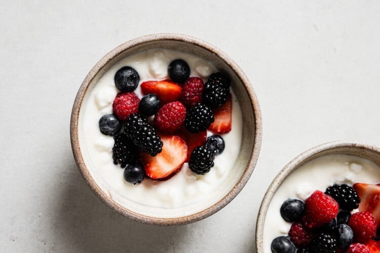 cottage cheese, yogurt and berries in a bowl