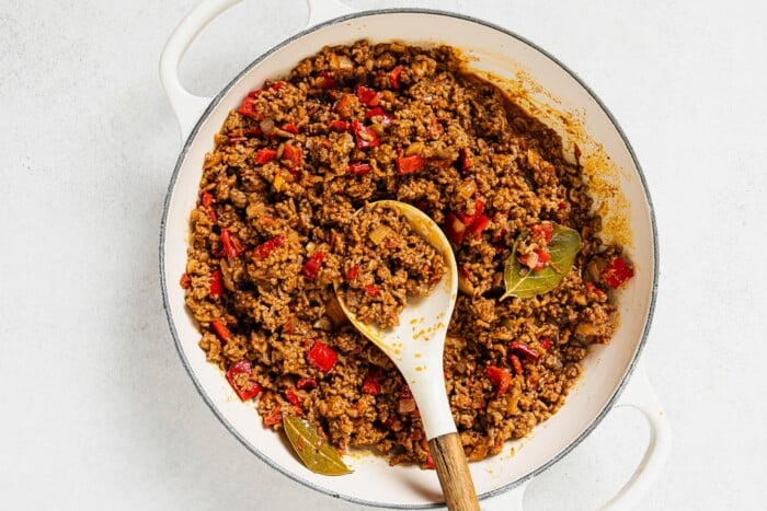 Picadillo in a white skillet