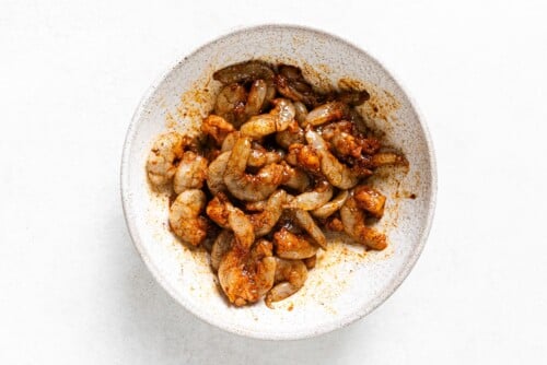 seasoned raw shrimp in a bowl