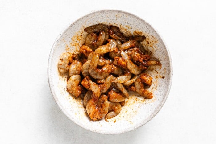 seasoned raw shrimp in a bowl