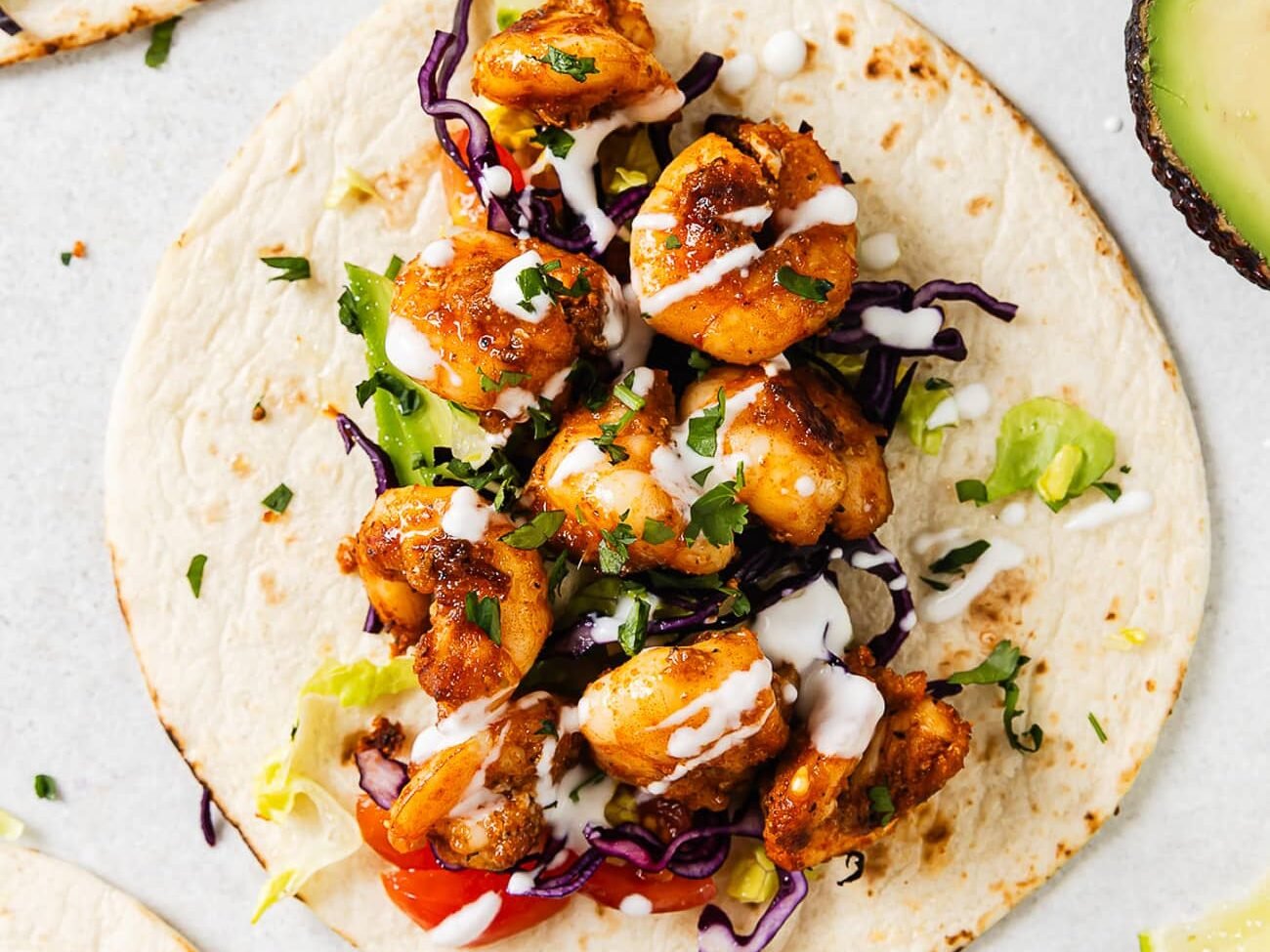 overhead view of shrimp tacos on a countertop