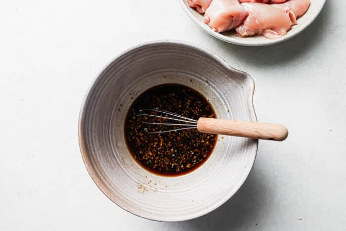 Marinade whisked together in a large bowl.