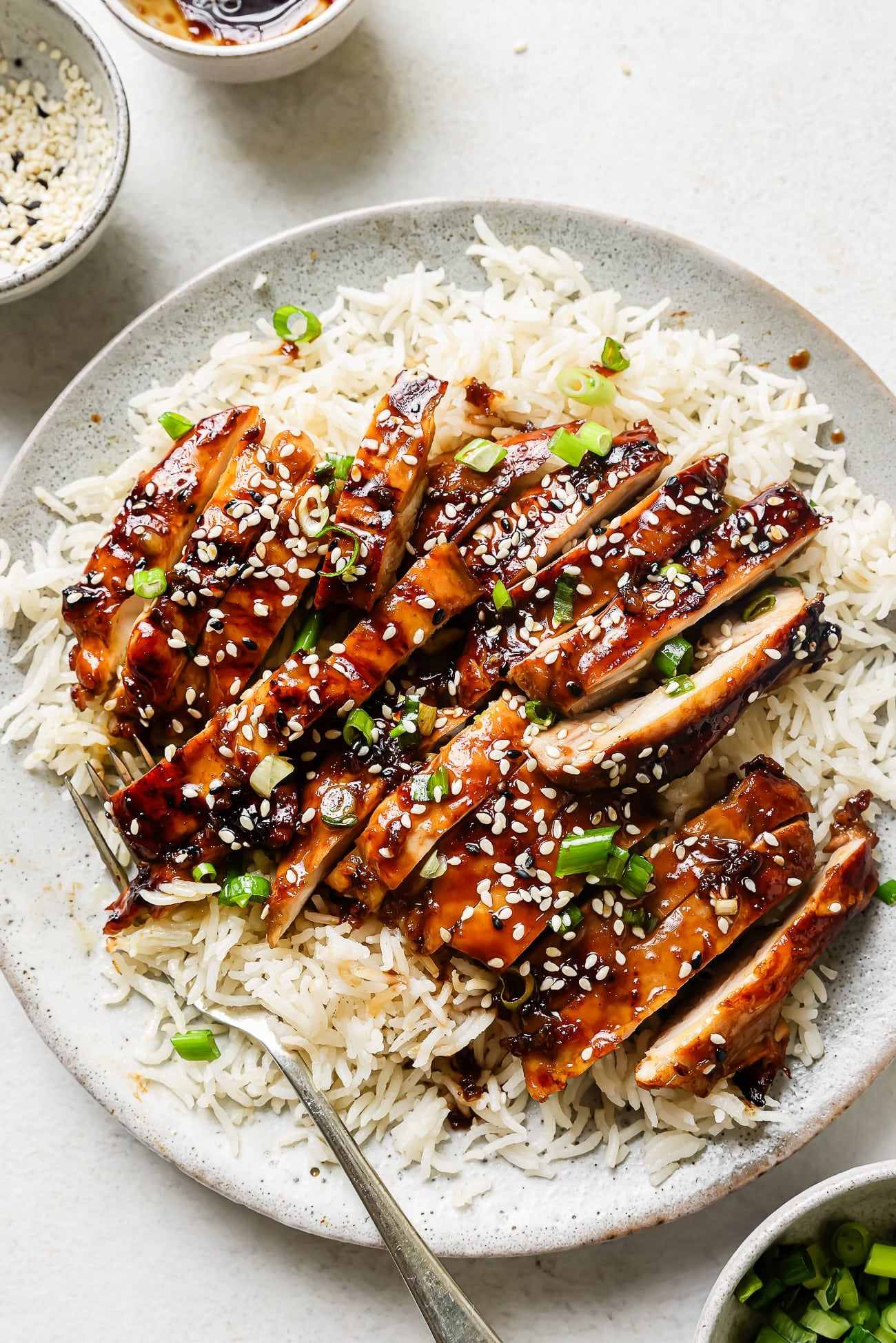 Teriyaki chicken on a bed of rice.