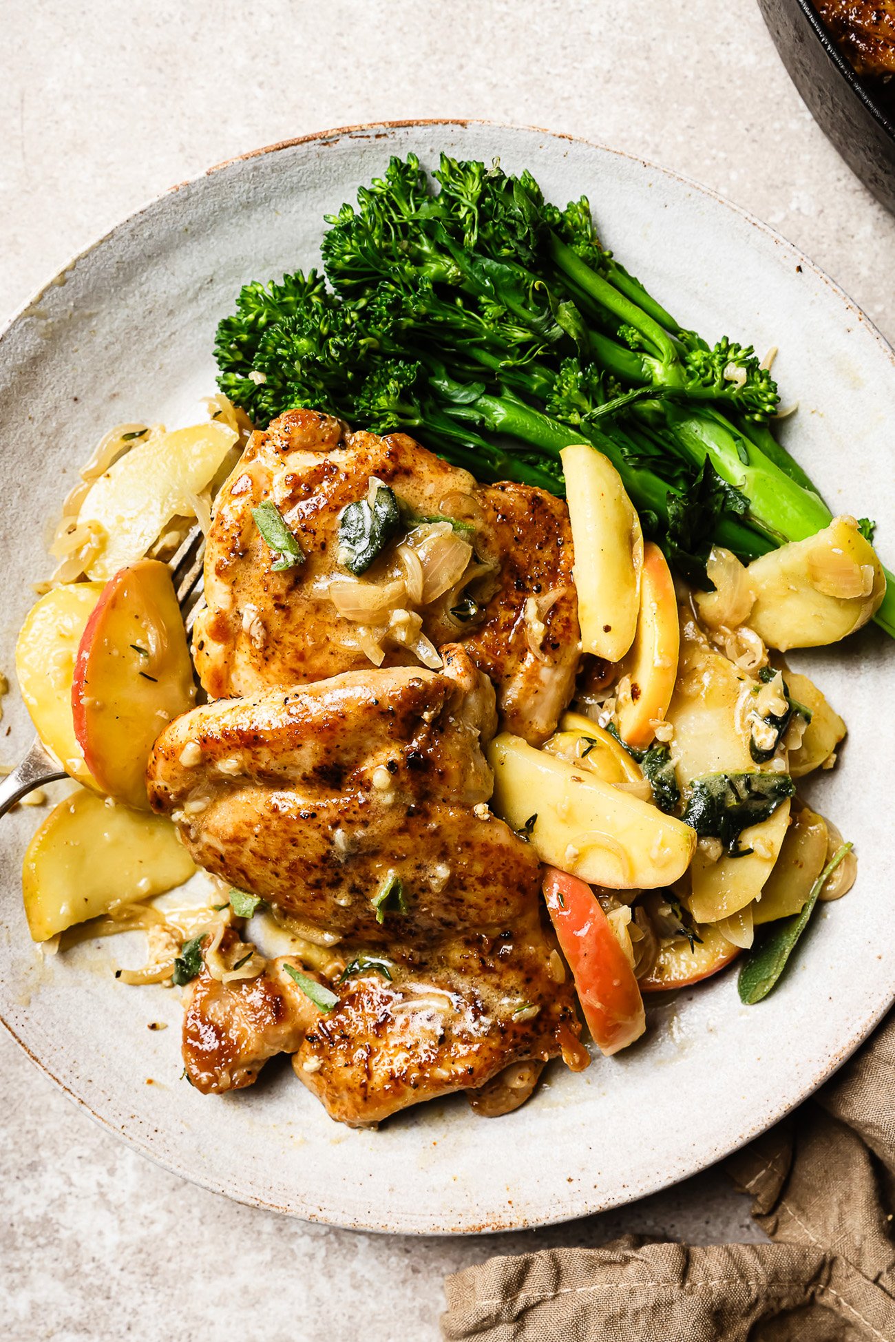 apple cider chicken on a white plate.