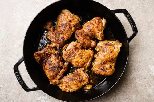 cooked chicken in a cast iron skillet