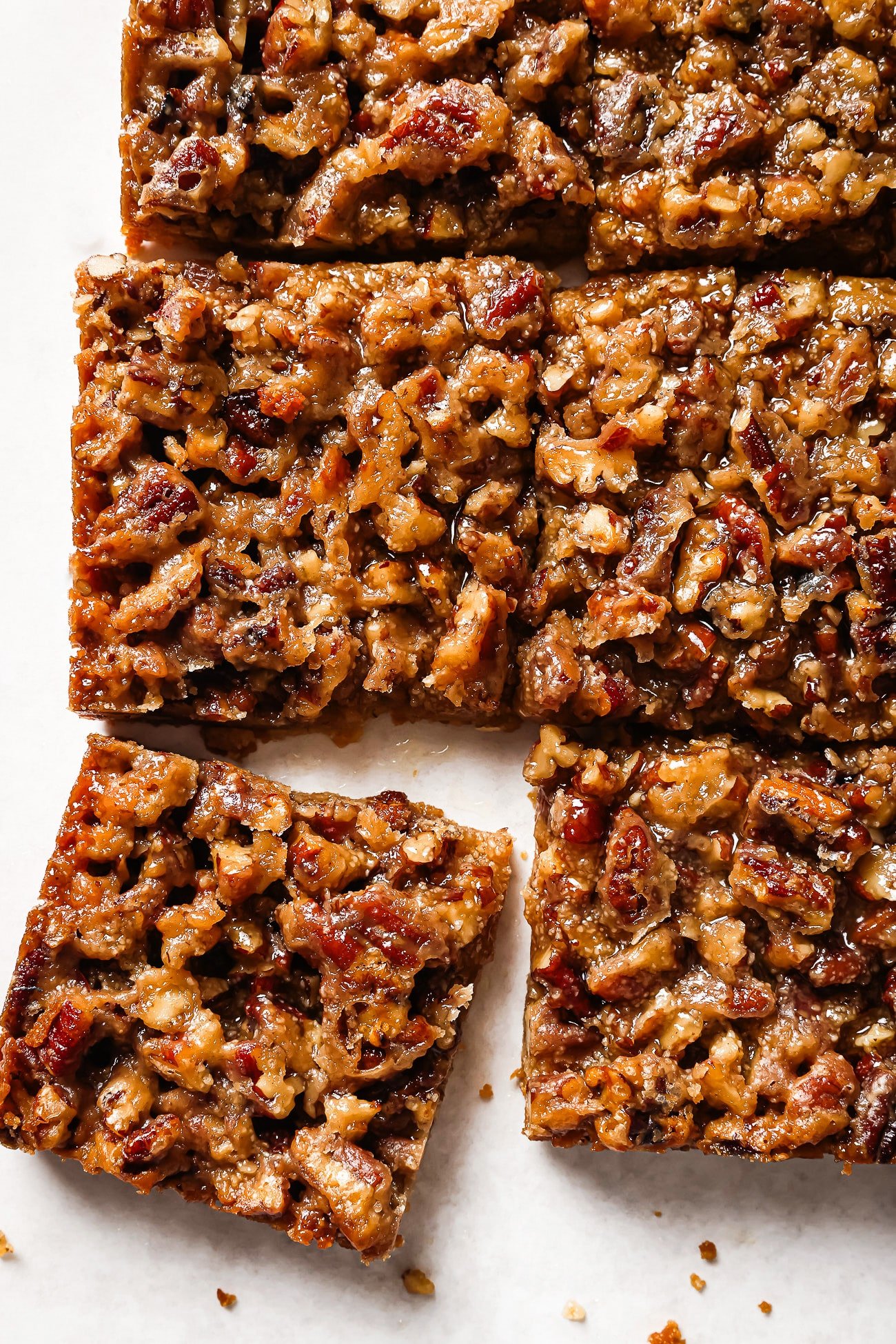 Close up of pecan pie bars on a countertop