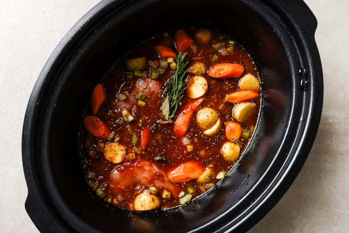 Golden sautéed onions inside a skillet.