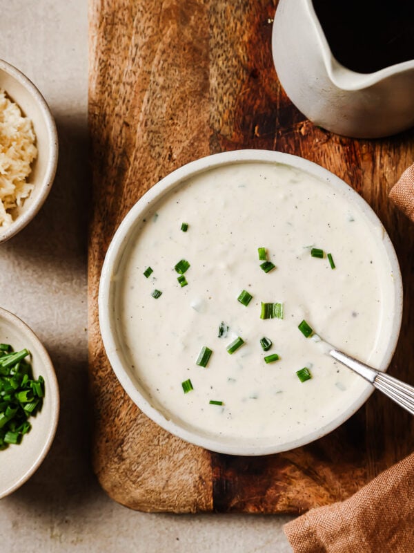 overhead view of horseradish sauce in a white bowl.