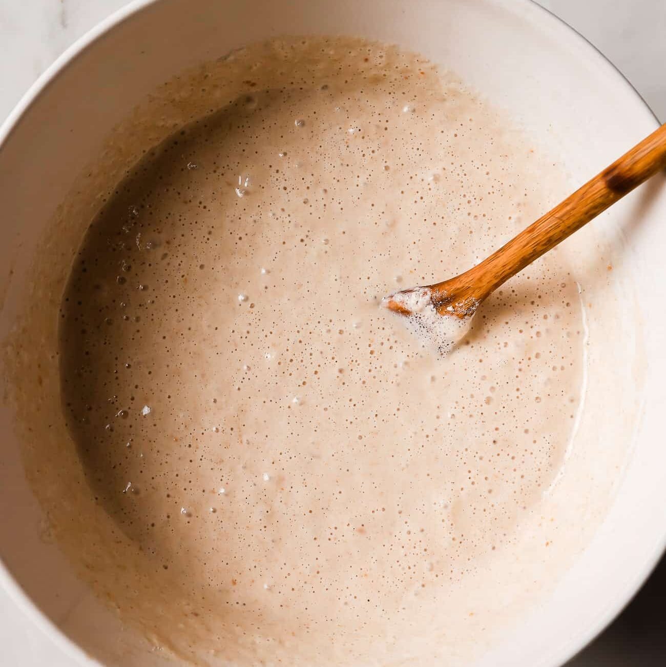wet ingredients inside of a white bowl